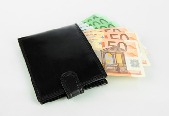 Euro in wallet isolated on white