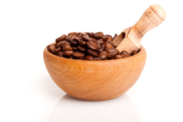 coffee beans in the wooden bowl, isolated on white background