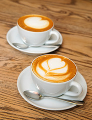 two cappuccino cups