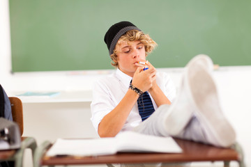 problematic teen boy smoking