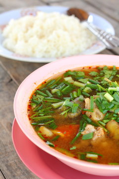 Hot and sour soup and rice -  Tom - Yum thai food.