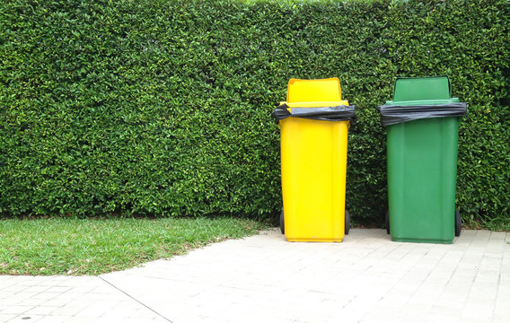 Different Colored Bins Green And Yellow Waste Container