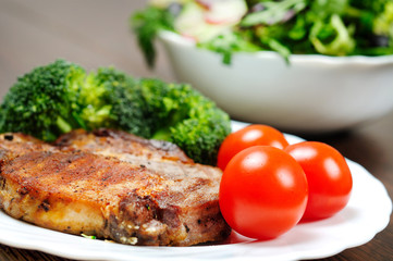 Grilled meat with salad