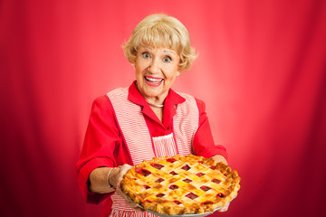 Granny Holding Lattice Top Cherry Pie