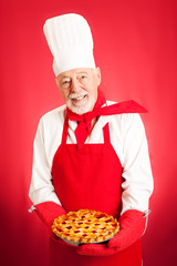 Baker Holding Cherry Pie