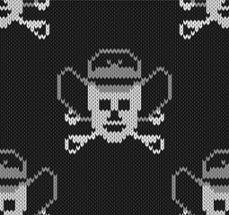 Knitted background with skulls  in a cowboys hat