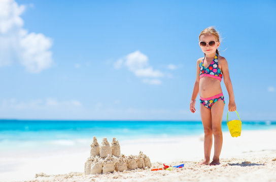 Little girl at tropical beach