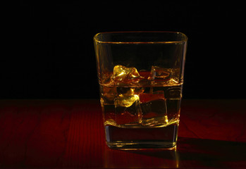 Whiskey glass on the table
