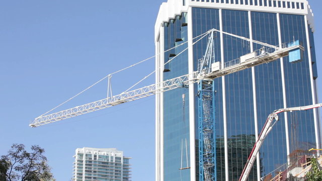 Stock footage of construction cranes