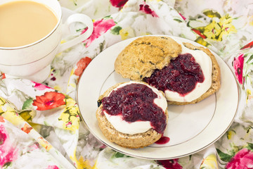 Scones with clotted cream and strawberry jam