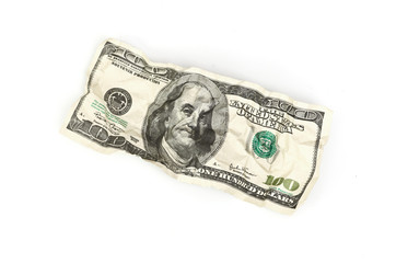 crumpled hundred dollar isolated on white background