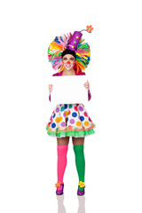 Funny girl clown with a blank advertising for text