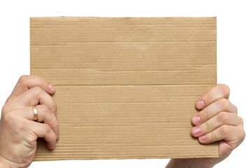 cardboard frame in the hands on a white background