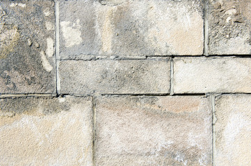 Closeup of decaying limestone wall