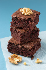 Chocolate brownie on baking parchment paper