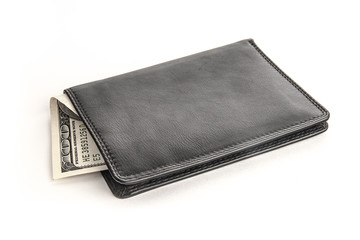 US dollars in a black wallet isolated on white