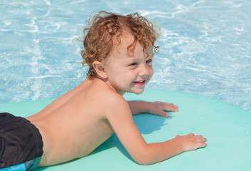 little boy in the swimming pool