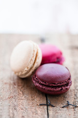 Macaroons on wooden table
