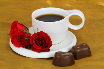 Coffee, red roses and milky chocolates