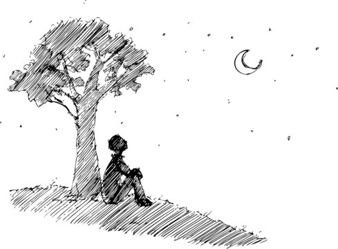 Man looking at the moon under a the tree