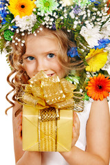 Child with gift box and flower.