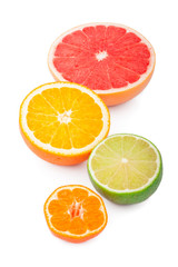 Half of fresh citrus fruits, isolated on white background