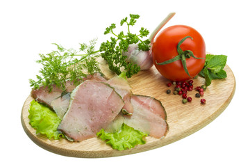 Ripe fresh ham with vegetables