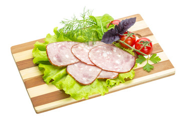 Sausages with salad and basil