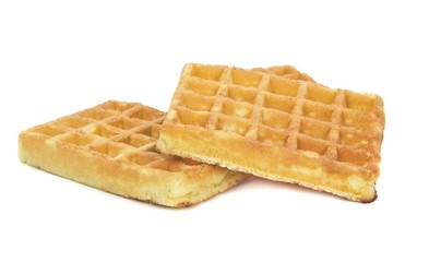 Fresh sponge waffles on a white background