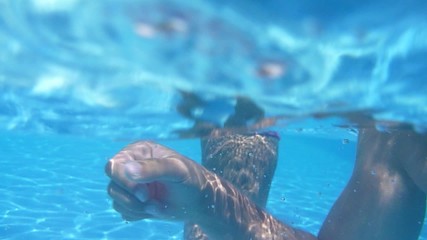 girls swimming in the pool