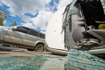 Damaged cars at accident place, view from low angle