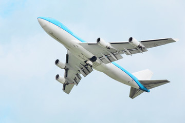 plane flies in sky