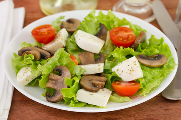 salad with portobello, cheese and tomato