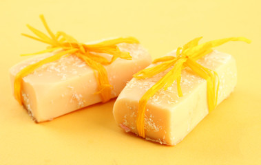 Natural handmade soap, on yellow background