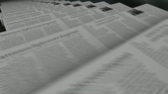 Folded newspapers in factory ready to ship out loop