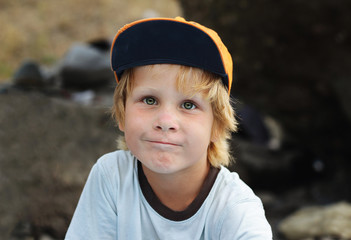 Closeup portrait of cheerful little boy