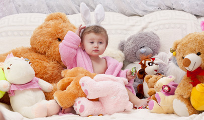 Little girl with toys