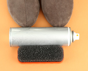 Set of stuff for cleaning and polish shoes, on color background