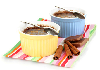 Chocolate pudding in bowls for baking isolated on white