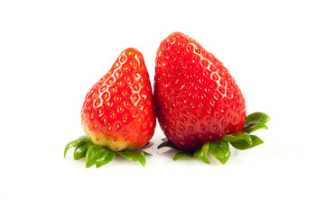 Strawberries with leaves. Isolated on a white background.