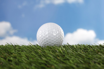 Golf ball on the green grass
