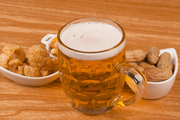 Tankard of beer and snacks