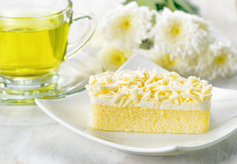 Cup of herbal tea and fresh cake