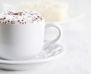 Cup of coffee and fresh cake