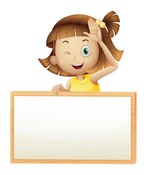 A girl blinking her eye holding an empty board