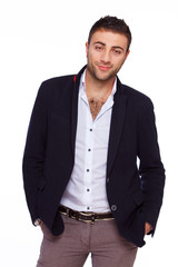 Self confident armenian man is posing on a white background