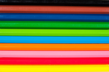 background of rainbow of colorful pencils