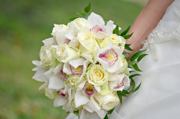 Bouquet of orchid flowers and roses