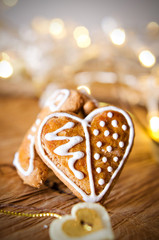 Gingerbread cookies over wooden background