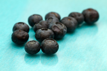 blueberries on a blue background